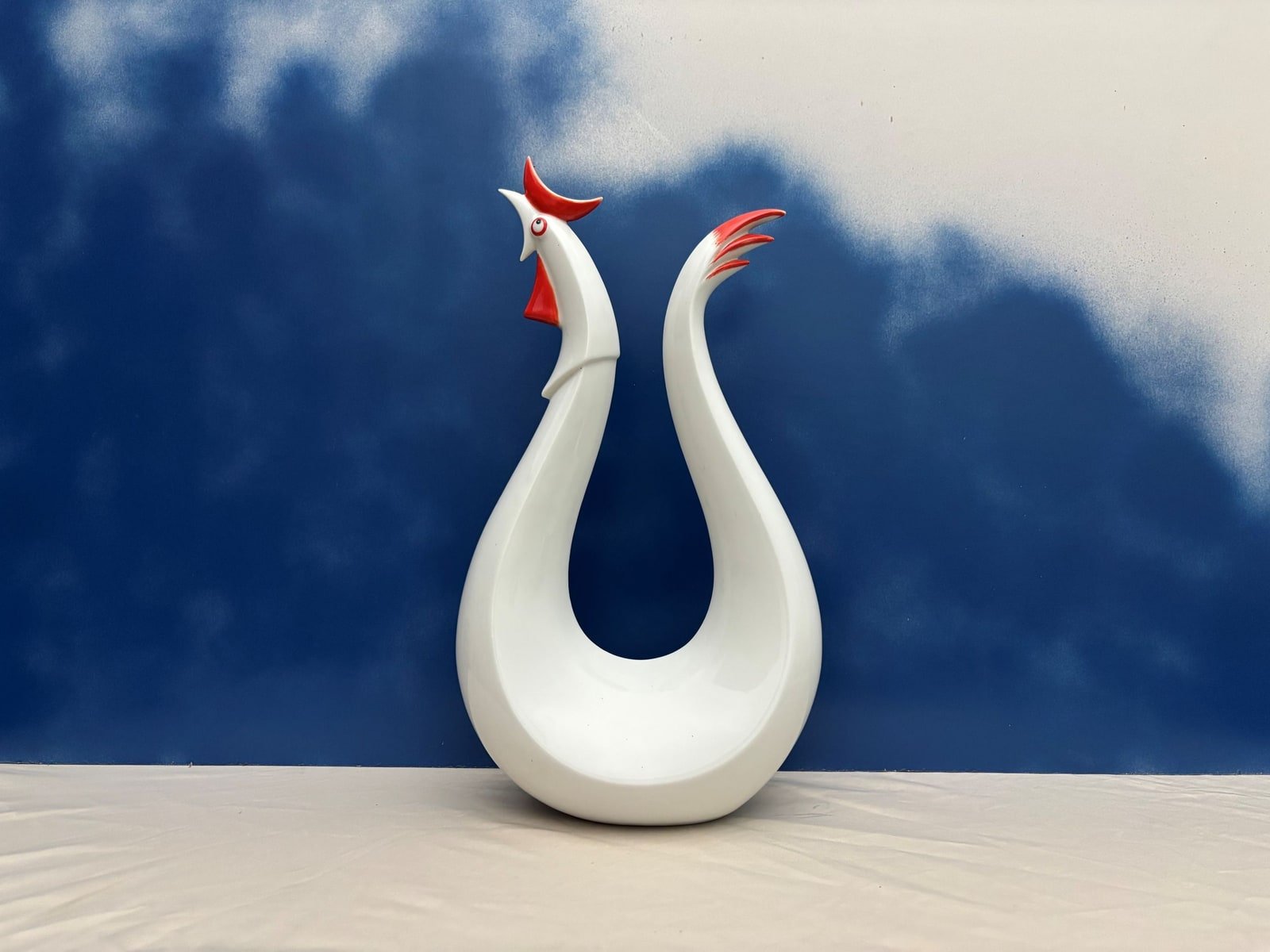 White ceramic paired crane sculpture